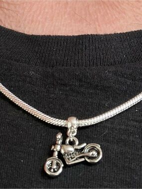 Real 925  sterling silver necklace with motorcycle pendant.24”long snake chain.